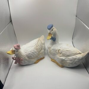 Charming White Duck Figurines with Pink and Blue Accents